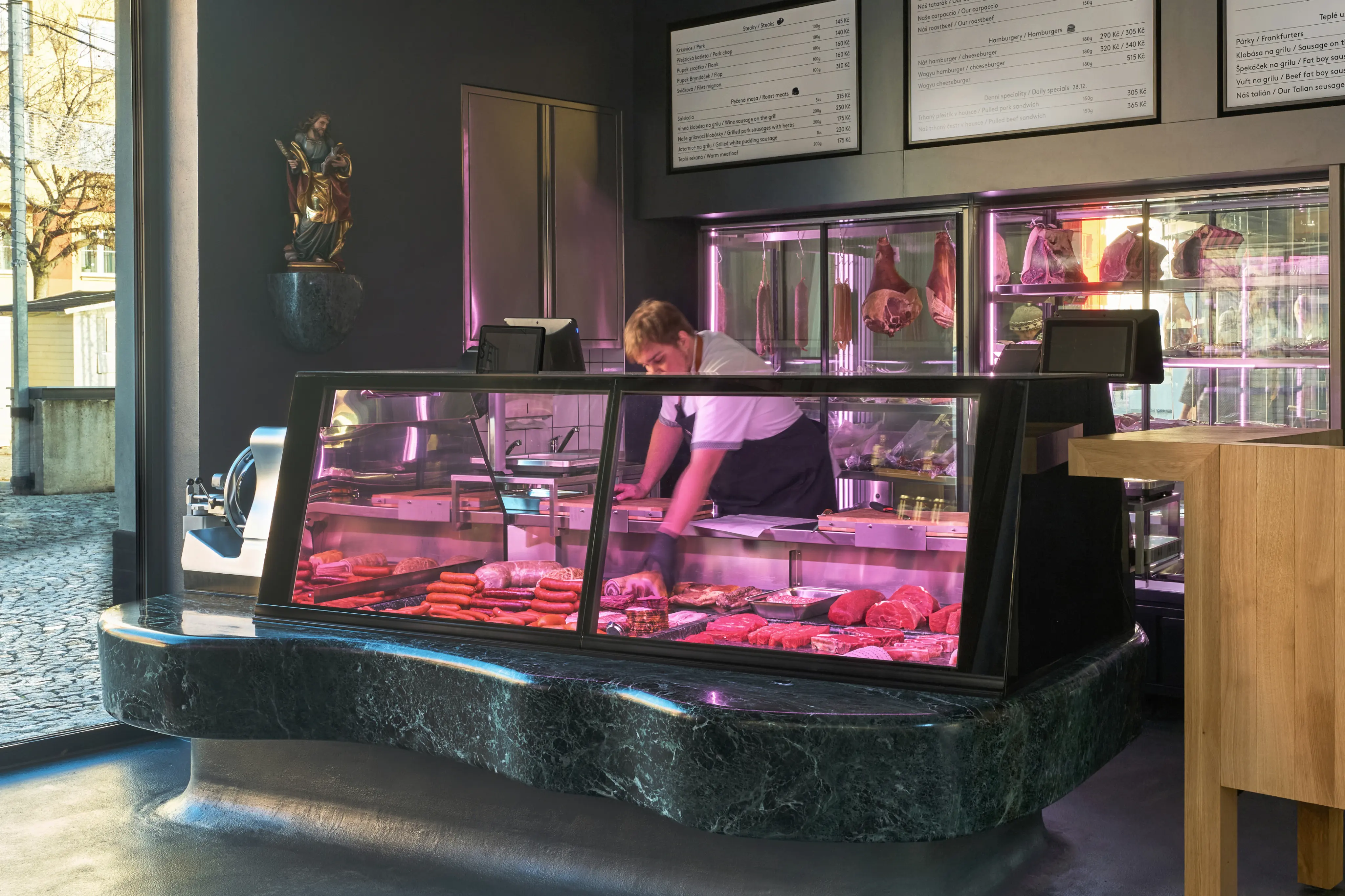Butcher counter at Naše maso in Holešovice Market.